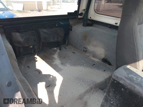 1998 Jeep Wrangler Sport with VIN 1J4FY19S2WP786844, listed as a IAAI auction lot 42382789 with 306,228 mi miles and . Bid and sale history available at DreamBid. Image 8.