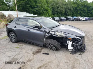 2023 Lexus RZ 450e Premium z VIN JTJAAAAB8PA020411, wystawiony jako Copart lot #58023424 z przebiegiem 1274 mil mil oraz Szkody całkowita. Historia ofert i sprzedaży dostępna na DreamBid. Obrazek 4.