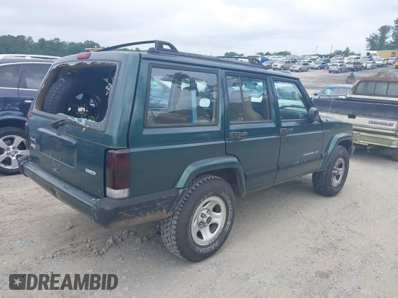 2000 Jeep Cherokee z VIN 1J4FT48S4YL265734, wystawiony jako IAAI lot #42556994 z przebiegiem 228 162 mil mil oraz . Historia ofert i sprzedaży dostępna na DreamBid. Obrazek 4.