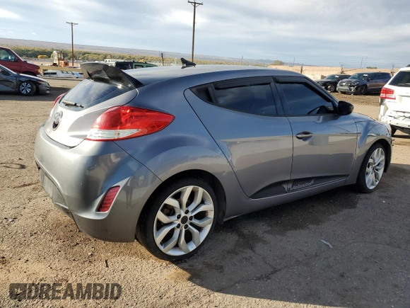 2013 Hyundai Veloster w/Black Int z VIN KMHTC6AD0DU135773, wystawiony jako Copart lot #41367875 z przebiegiem 96 487 mil mil oraz Szkoda całkowita • Salvage title. Historia ofert i sprzedaży dostępna na DreamBid. Obrazek 3.