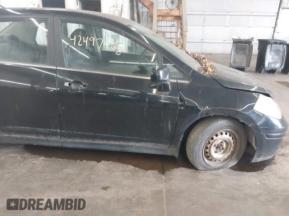 2007 Nissan Versa SL с VIN 3N1BC11E97L430772, выставлен на аукционе IAAI как лот 42497978 с пробегом 174 151 миль миль и . История ставок и продаж доступна на DreamBid. Изображение 14.