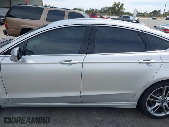 2016 Ford Fusion Titanium with VIN 3FA6P0K90GR132709, listed as a IAAI auction lot 41790873 with 63,269 mi miles and . Bid and sale history available at carsss.com. Image 14.