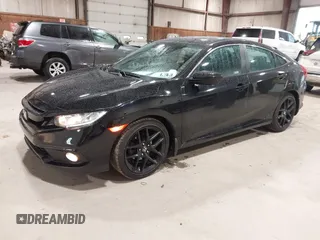2019 Honda Civic Sport with VIN 2HGFC2F89KH557466, listed as a IAAI auction lot 42335216 with 138,747 mi miles and . Bid and sale history available at DreamBid. Image 2.