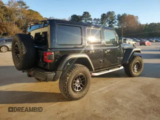 2022 Jeep Wrangler Unlimited High Tide with VIN 1C4HJXDG0NW247152, listed as a Copart auction lot 82371674 with 32,417 mi miles and Salvage Title. Bid and sale history available at DreamBid. Image 3.
