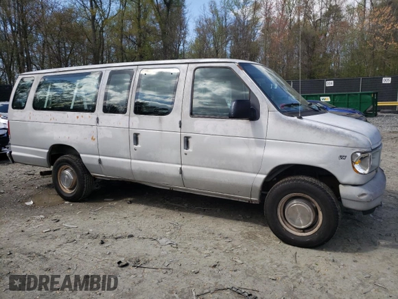 1999 Ford Econoline Passenger XL with VIN 1FBSS31LXXHA39417, listed as a Copart auction lot 52817645 with 109,930 mi miles and Salvage title. Bid and sale history available at DreamBid. Image 4.