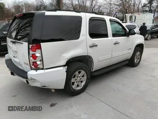 2013 GMC Yukon SLT with VIN 1GKS2CE09DR238626, listed as a IAAI auction lot 41758168 with 170,371 mi miles. Bid and sale history available at carsss.com. Image 4.