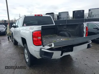 2018 Chevrolet Silverado 1500 LT with VIN 3GCUKREC3JG453433, listed as a IAAI auction lot 38138441 with 53,496 mi miles. Bid and sale history available at carsss.com. Image 3.