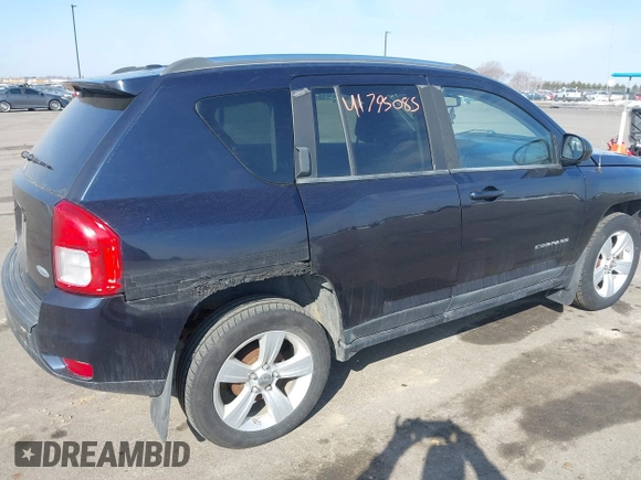 2011 Jeep Compass with VIN 1J4NT1FA7BD208658, listed as a IAAI auction lot 41795085 with 198,880 mi miles. Bid and sale history available at carsss.com. Image 4.