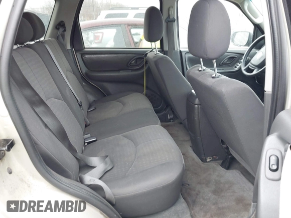 2005 Mazda Tribute i with VIN 4F2YZ02Z35KM57658, listed as a IAAI auction lot 41547562 with 131,303 mi miles and . Bid and sale history available at carsss.com. Image 8.