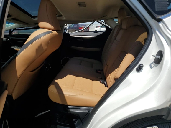2016 Lexus NX 200t with VIN JTJBARBZ2G2067779, listed as a Copart auction lot 65394335 with 36,573 mi miles and Salvage title. Bid and sale history available at DreamBid. Image 11.