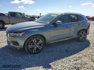 2021 Volvo XC60 Momentum with VIN YV4102DK2M1758320, listed as a Copart auction lot 76136624 with 33,506 mi miles and Salvage Title. Bid and sale history available at carsss.com. Image 1.