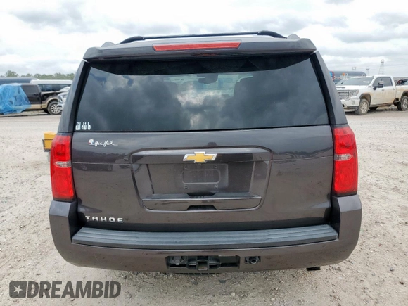 2016 Chevrolet Tahoe LT with VIN 1GNSKBKC5GR435051, listed as a Copart auction lot 57358325 with 171,241 mi miles and Salvage title. Bid and sale history available at DreamBid. Image 6.