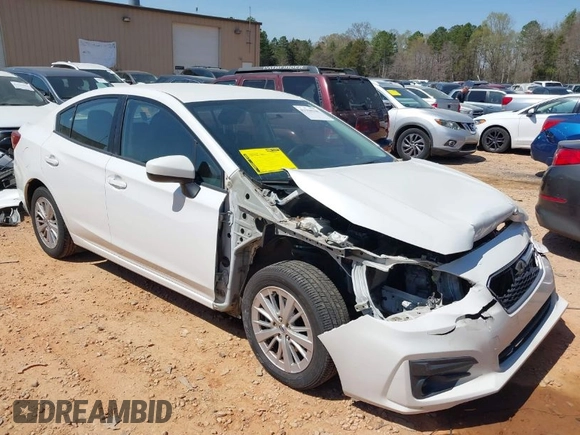 2017 Subaru Impreza Premium with VIN 4S3GKAB63H3617614, listed as a IAAI auction lot 41908948 with 102,722 mi miles and . Bid and sale history available at DreamBid. Image 1.