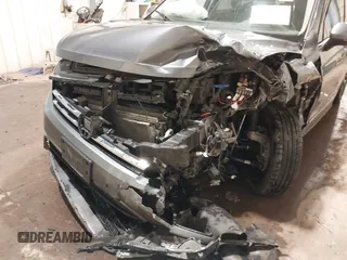 2021 Volkswagen Tiguan SE with VIN 3VV3B7AX3MM118463, listed as a IAAI auction lot 42138702 with 48,058 mi miles and . Bid and sale history available at DreamBid. Image 6.
