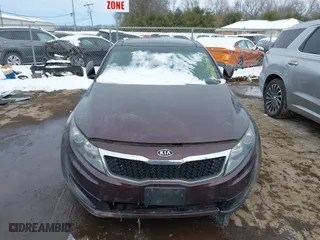 2011 Kia Optima EX with VIN KNAGN4A75B5158176, listed as a IAAI auction lot 41553536 with 140,785 mi miles. Bid and sale history available at carsss.com. Image 11.