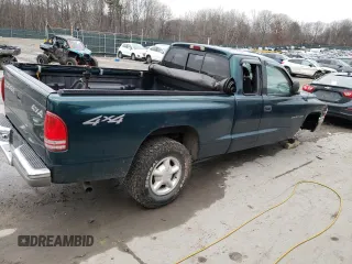 1997 Dodge Dakota z VIN 1B7GG23XXVS260724, wystawiony jako Copart lot #81040004 z przebiegiem Nie podano mil oraz Szkoda całkowita • Salvage title. Historia ofert i sprzedaży dostępna na DreamBid. Obrazek 3.