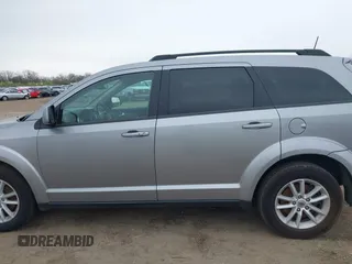 2019 Dodge Journey SE with VIN 3C4PDCBBXKT810874, listed as a IAAI auction lot 41960889 with 170,441 mi miles and . Bid and sale history available at DreamBid. Image 14.