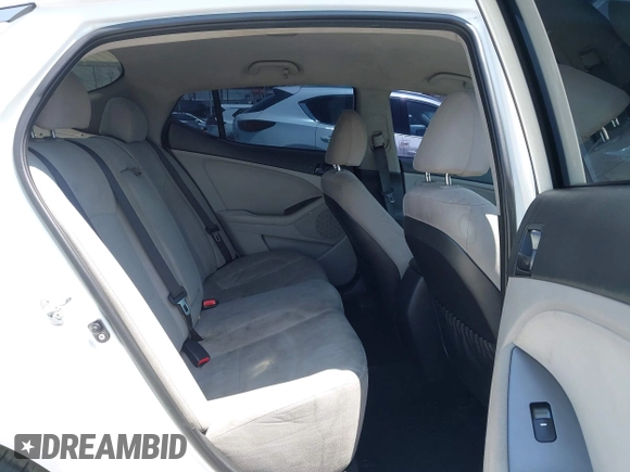 2015 Kia Optima LX with VIN KNAGM4A78F5661726, listed as a IAAI auction lot 42161244 with 105,521 mi miles. Bid and sale history available at carsss.com. Image 8.