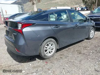 2020 Toyota Prius L Eco with VIN JTDKARFU8L3114786, listed as a IAAI auction lot 41804909 with 196,099 mi miles. Bid and sale history available at carsss.com. Image 4.