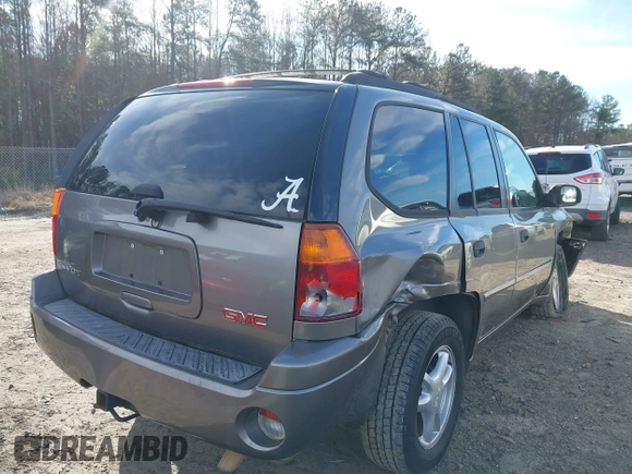 2007 GMC Envoy SLE with VIN 1GKDS13S372241844, listed as a IAAI auction lot 41575443 with 144,726 mi miles. Bid and sale history available at carsss.com. Image 4.