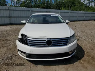 2014 Volkswagen CC Sport with VIN WVWBP7AN8EE538737, listed as a Copart auction lot 68656344 with 131,941 mi miles and Salvage Title. Bid and sale history available at carsss.com. Image 5.
