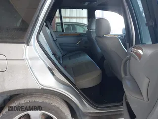 2001 BMW X5 3.0i with VIN WBAFA53591LH79412, listed as a IAAI auction lot 41410946 with 186,315 mi miles. Bid and sale history available at carsss.com. Image 8.