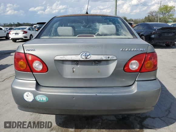 2004 Toyota Corolla CE with VIN 1NXBR32E74Z240293, listed as a Copart auction lot 52624445 with 299,999 mi miles and Salvage Title. Bid and sale history available at DreamBid. Image 6.