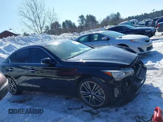 2015 Infiniti Q50 with VIN JN1BV7AR5FM390226, listed as a IAAI auction lot 41588250 with 121,928 mi miles. Bid and sale history available at carsss.com. Image 14.
