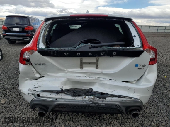 2015 Volvo V60 z VIN YV1902SS6F1228244, wystawiony jako Copart lot #43789925 z przebiegiem 69 835 mil mil oraz Szkoda całkowita • Salvage title. Historia ofert i sprzedaży dostępna na DreamBid. Obrazek 6.
