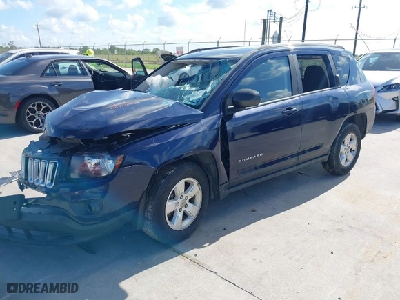 2014 Jeep Compass Sport with VIN 1C4NJCBA8ED594055, listed as a IAAI auction lot 40124452 with 106,067 mi miles. Bid and sale history available at carsss.com. Image 2.