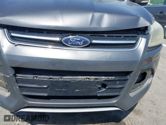 2015 Ford Escape Titanium with VIN 1FMCU0J94FUB24350, listed as a IAAI auction lot 42065641 with 168,215 mi miles. Bid and sale history available at carsss.com. Image 6.