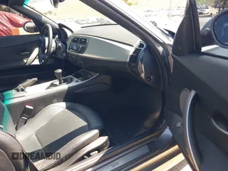 2004 BMW Z4 2.5i with VIN 4USBT33454LR66908, listed as a IAAI auction lot 42013003 with 71,368 mi miles and . Bid and sale history available at DreamBid. Image 5.