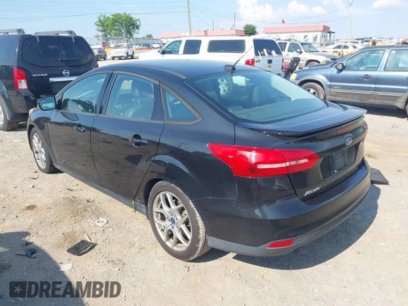 2015 Ford Focus SE z VIN 1FADP3F25FL284097, wystawiony jako IAAI lot #42553323 z przebiegiem 139 647 mil mil oraz . Historia ofert i sprzedaży dostępna na DreamBid. Obrazek 3.