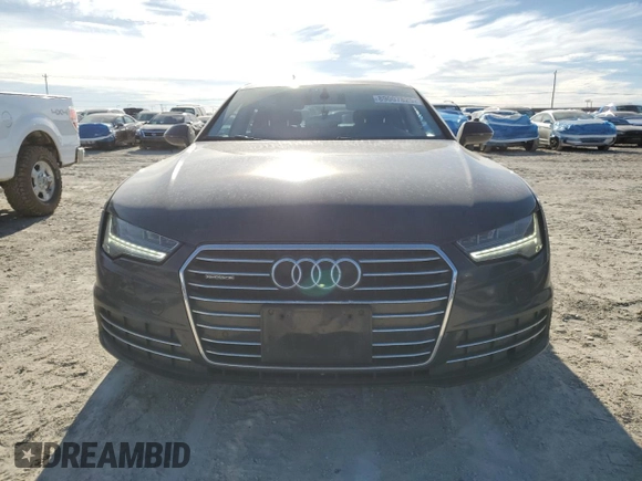 2017 Audi A7 Premium Plus с VIN WAUW2AFCXHN124798, выставлен на аукционе Copart как лот 89007825 с пробегом 160 822 миль миль и Списание • Salvage title. История ставок и продаж доступна на DreamBid. Изображение 5.