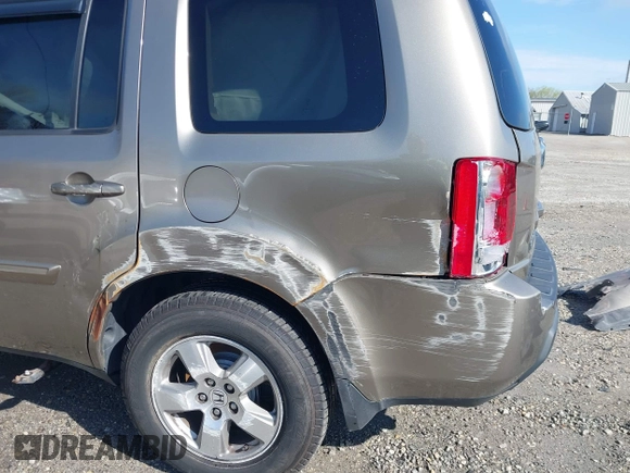 2011 Honda Pilot EX-L with VIN 5FNYF4H53BB063509, listed as a IAAI auction lot 41949079 with 173,580 mi miles. Bid and sale history available at carsss.com. Image 20.