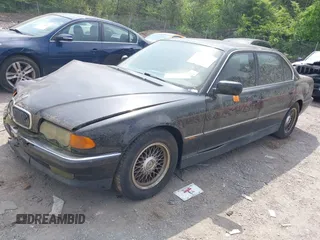 1999 BMW 7 Series 740il with VIN WBAGH8334XDP01166, listed as a IAAI auction lot 42073939 with 1 mi miles. Bid and sale history available at carsss.com. Image 2.