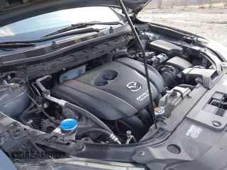 2016 Mazda CX-5 Sport with VIN JM3KE4BY5G0829927, listed as a IAAI auction lot 41678552 with 121,476 mi miles. Bid and sale history available at carsss.com. Image 17.