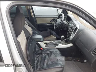 2005 Mercury Mariner Convenience z VIN 4M2YU57Z55DJ18600, wystawiony jako IAAI lot #42082068 z przebiegiem 141 530 mil mil oraz . Historia ofert i sprzedaży dostępna na DreamBid. Obrazek 5.