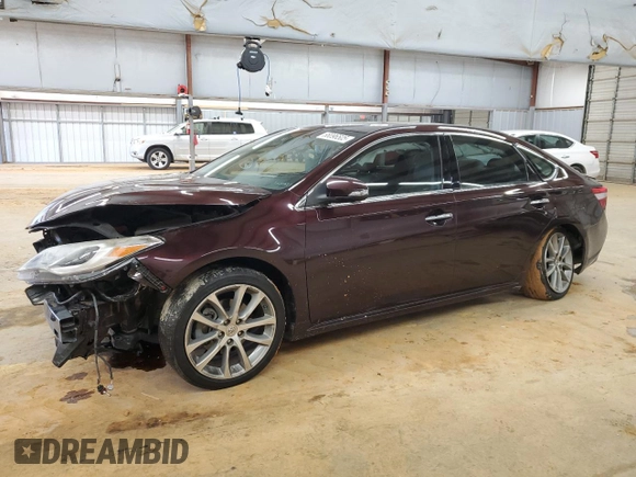 2014 Toyota Avalon Limited with VIN 4T1BK1EB7EU105830, listed as a Copart auction lot 88096505 with 106,626 mi miles and Salvage Title. Bid and sale history available at carsss.com. Image 1.