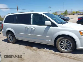 2014 Dodge Grand Caravan SXT with VIN 2C4RDGCG1ER429495, listed as a IAAI auction lot 42058513 with 136,936 mi miles and . Bid and sale history available at DreamBid. Image 13.