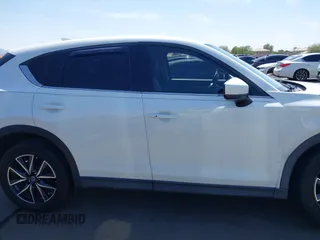 2018 Mazda CX-5 Grand Touring с VIN JM3KFADM7J0373815, выставлен на аукционе IAAI как лот 42500311 с пробегом 106 354 миль миль и . История ставок и продаж доступна на DreamBid. Изображение 13.