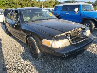 2004 Ford Police Interceptor Base w/3.27 Axle with VIN 2FAFP71WX4X149014, listed as a Copart auction lot 71305734 with 180,542 mi miles and Salvage Title. Bid and sale history available at carsss.com. Image 4.