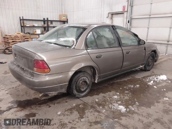 1998 Saturn SL z VIN 1G8ZH528XWZ240574, wystawiony jako IAAI lot #41588681 z przebiegiem Nie podano mil oraz . Historia ofert i sprzedaży dostępna na DreamBid. Obrazek 4.