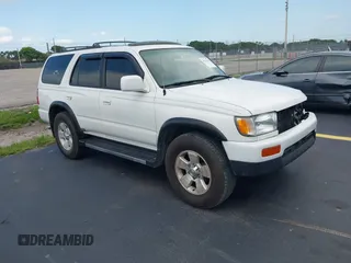 1998 Toyota 4Runner SR5 z VIN JT3GN86R5W0060650, wystawiony jako IAAI lot #42373192 z przebiegiem 264 886 mil mil oraz . Historia ofert i sprzedaży dostępna na DreamBid. Obrazek 1.