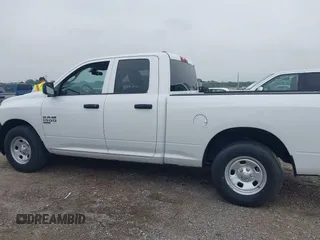 2023 Ram 1500 Tradesman z VIN 1C6RR6FG9PS527089, wystawiony jako IAAI lot #42261047 z przebiegiem 20 684 mil mil oraz . Historia ofert i sprzedaży dostępna na DreamBid. Obrazek 14.