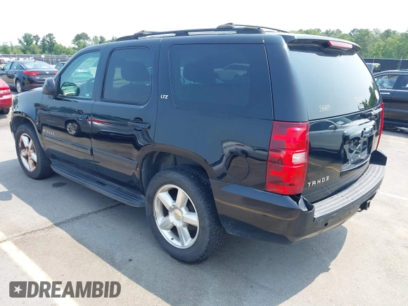 2007 Chevrolet Tahoe LTZ with VIN 1GNFC13007R111180, listed as a IAAI auction lot 42381749 with 126,472 mi miles and . Bid and sale history available at DreamBid. Image 3.