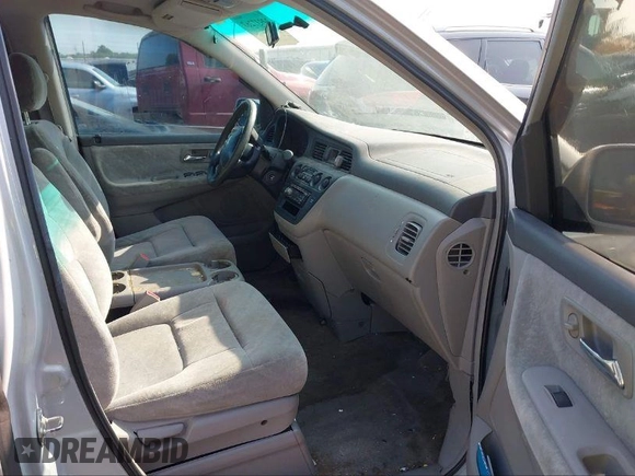 2003 Honda Odyssey EX z VIN 5FNRL18613B111952, wystawiony jako IAAI lot #40852383 z przebiegiem Nie podano mil oraz . Historia ofert i sprzedaży dostępna na DreamBid. Obrazek 5.
