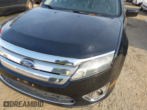 2012 Ford Fusion SEL z VIN 3FAHP0JA1CR190133, wystawiony jako IAAI lot #41209277 z przebiegiem 194 871 mil mil oraz . Historia ofert i sprzedaży dostępna na DreamBid. Obrazek 6.
