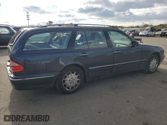 2001 Mercedes-Benz E-Class AWD with VIN WDBJH82J81X052002, listed as a Copart auction lot 82832724 with 187,464 mi miles and Salvage Title. Bid and sale history available at carsss.com. Image 3.