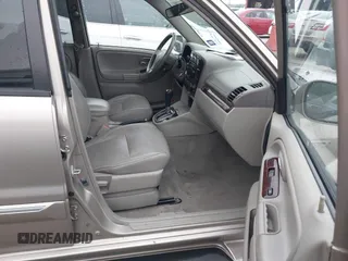 2004 Suzuki XL-7 LX with VIN JS3TX92V244114426, listed as a IAAI auction lot 42112014 with 169,377 mi miles. Bid and sale history available at carsss.com. Image 5.